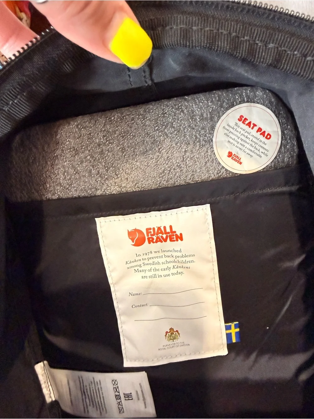 Fjallraven Kanken Mini Backpack in Black with Red Logo